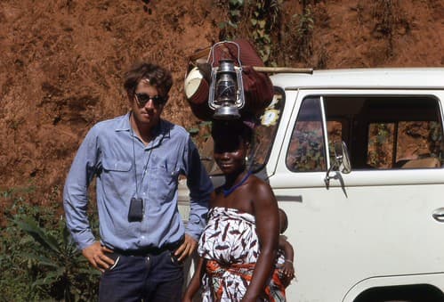 Me, a Loma lady on her way to do farmwork, her child and my VW.  near Zolowo, Liberia, 1968