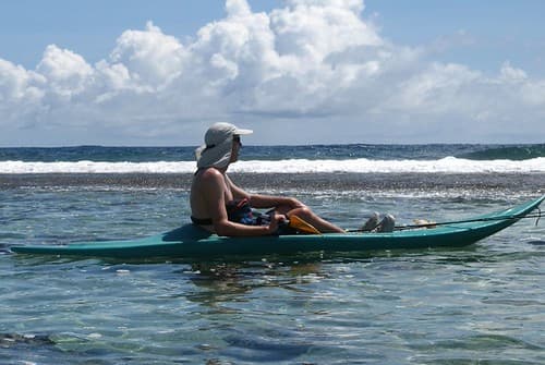 Kayaking in the lagoon, Huahine