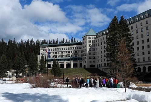 Lake Louise Rocky Mountaineer Tour Group Outside Chateau