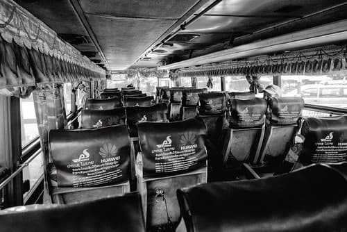 Boarding Early the Bus Back to Pakse