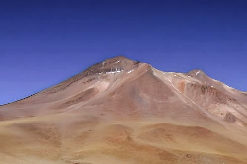 Cerros de Incahuasi mountains 5,704 m (18,714 ft), overlooking the Salar de Talar salt flat in the foreground near San Pedro de Atacama, Chile.