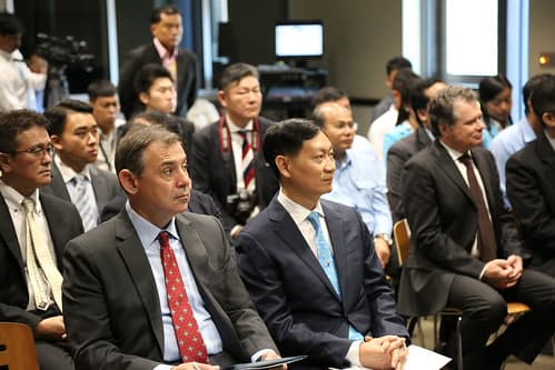 (Front row) William Heidt, U.S. Ambassador to Cambodia; Keo Rottanak, Managing Director of Electricité du Cambodge (EdC)