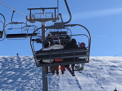 Poesy and Alice on the chair-lift, Les Gets, France