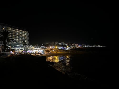 Illuminated beachfront town Costa Adeje at night, Tenerife, Canary Islands, Spain, March 2023