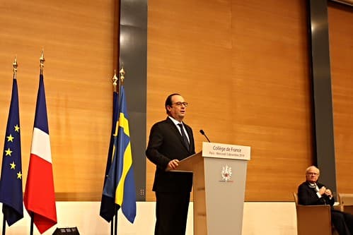 President of the Republic of France, François Hollande, with HMK Carl XVI Gustaf listening in the background