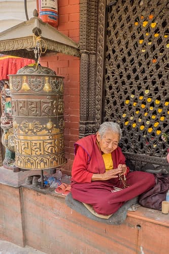 The old nun sitting on the steps of Boudhanaht Temple in Kathmandu since ages. She survived the earthquake :) (Explored May 7, 2015)